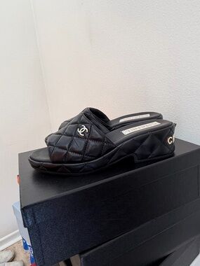CHANEL Black Quilted Slide Mules with Gold CC Accents